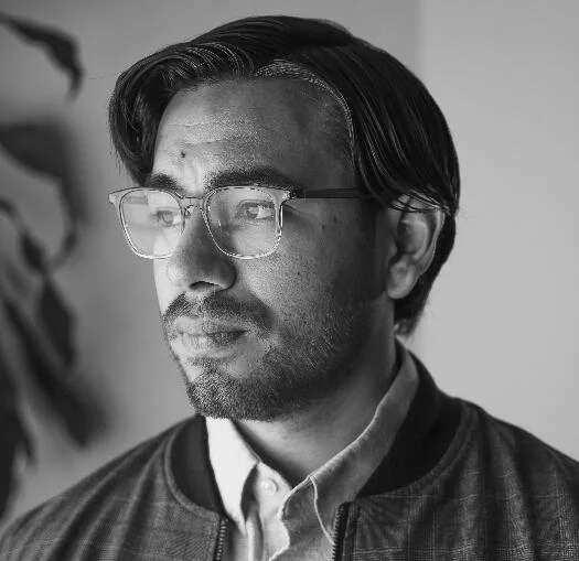 Black-and-white portrait of Cristian Medellin